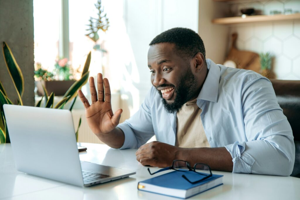 african american man business successful confident freelance video call conference virtual